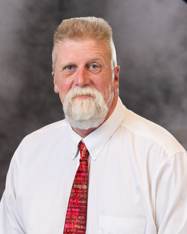 Headshot photo of board member Timothy L. Vest